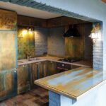 Blat kuchenny: laminat, kompakt, drewno czy spiek? Jak dobrać grubość, łączenia i montaż, żeby nie puchł przy zlewie